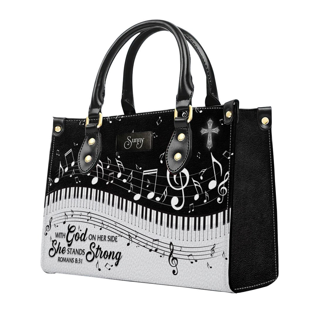 She Stands Strong Romans 8:31 Leather Handbag