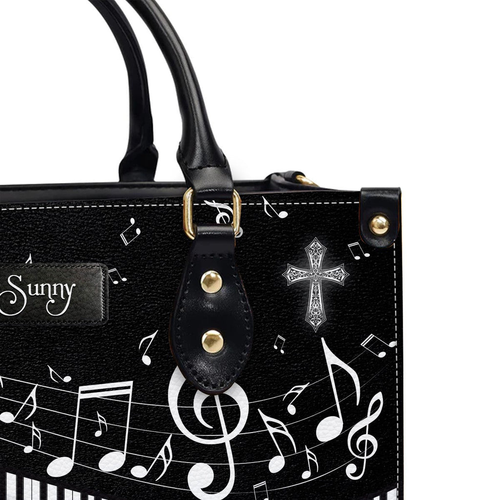 She Stands Strong Romans 8:31 Leather Handbag