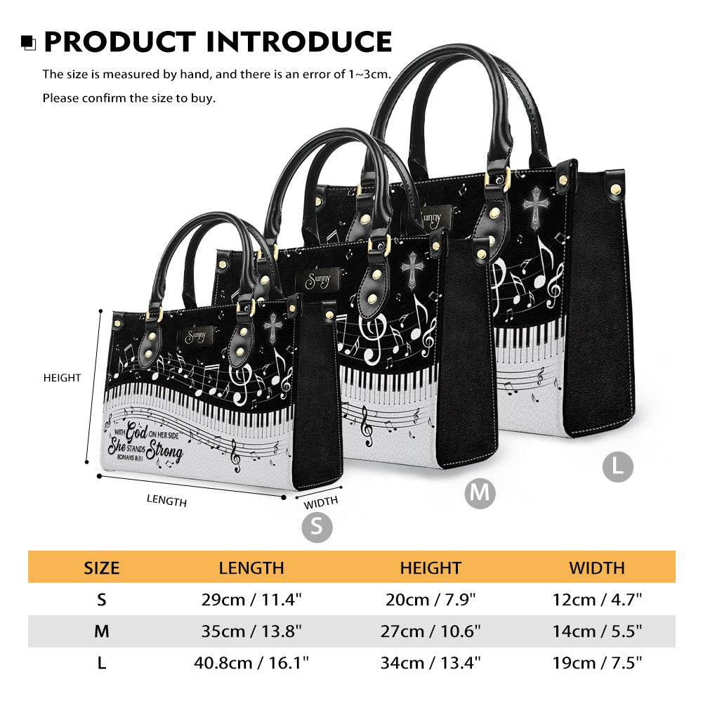 She Stands Strong Romans 8:31 Leather Handbag